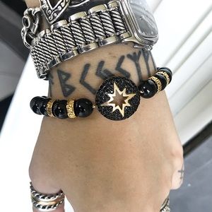 Gold star bracelet . Black onyx & yellow gold plated cz star charm bead bracelet